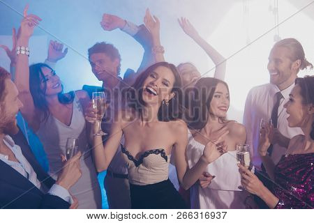 New Yeaer Christmas Xmas Concept. Lady In White Dress With Decollete Hold Beverage, Cocktail In Hand