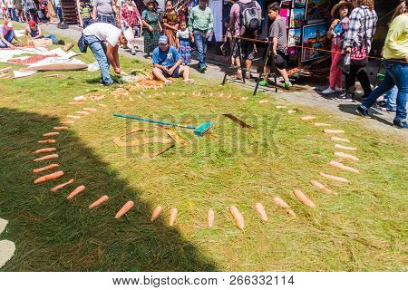 Panajachel, Guatemala - March 25, 2016: People Decorate Easter Carpets In Panajachel Village, Guatem
