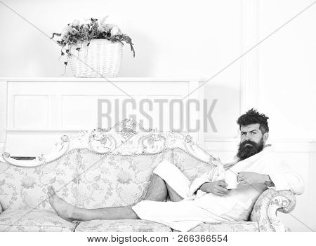 Luxury Life Concept. Man Sleepy In Bathrobe Drinks Coffee In Luxury Hotel In Morning, White Backgrou