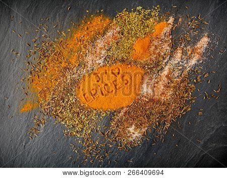 Mix Of Spices In Boxes On Grey Background