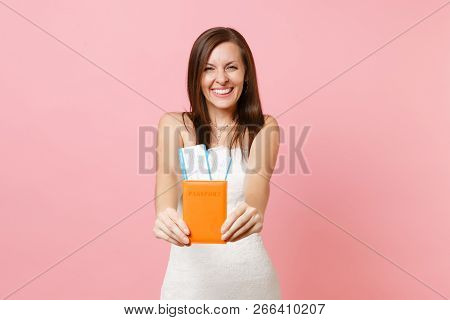 Pretty Joyful Bride Woman In Wedding Dress Showing Passport And Boarding Pass Ticket On Camera Going