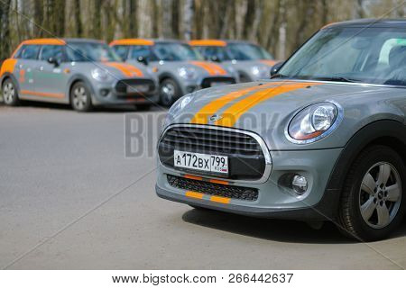 MOSCOW - APR 29, 2018: Four BMW mini cars of Moscow carsharing company You drive outdoor, carsharing is system of short-term car rental, focus on close car