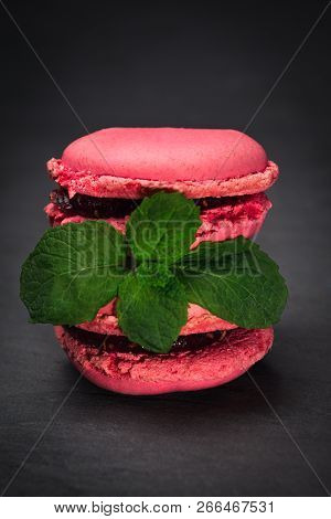 Macaroons With Mint Leaves On Grey Slate