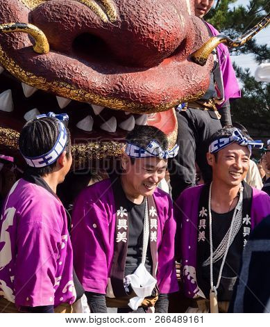 Karatsu, Japan - November 3, 2016: Japanese Men In Colorful Traditional Clothes At Karatsu Kunchi Fe
