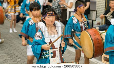 Tokyo, Japan - August 2018: Japanese Children Dancing Traditional Awaodori Dance In The Famous Koenj