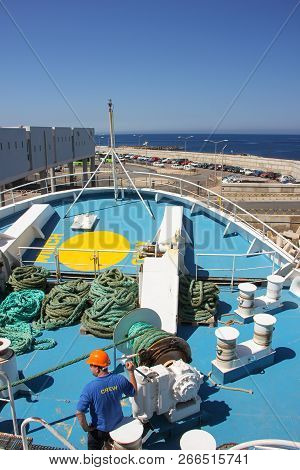Cirkewwa, Malta - May 2018: Crew Man Work On Cirkewwa Ferry Terminal During Loading Cars On Board