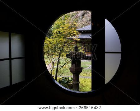 Nikko, Japan - October 23, 2016: Round Window With View Of The Garden In Imperial Tamozawa Residence