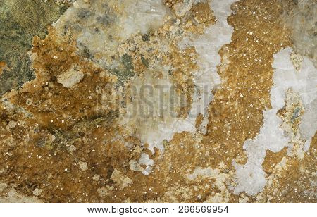 Andradite Gemstone Or Yellow Green Topazolite Background