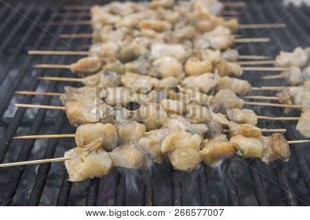 Rapan Meat On The Grill. Delicious Festive Barbecue. Food And Holiday Concept. Cooking Bbq Seafood O