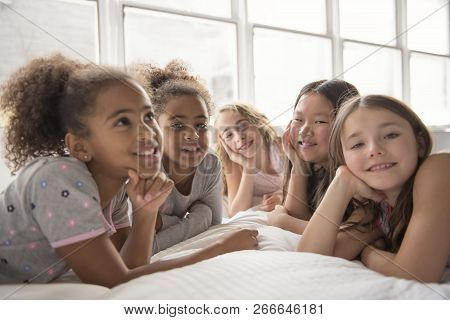 Large Group Of Her Friends Taking Goog Time On Bed
