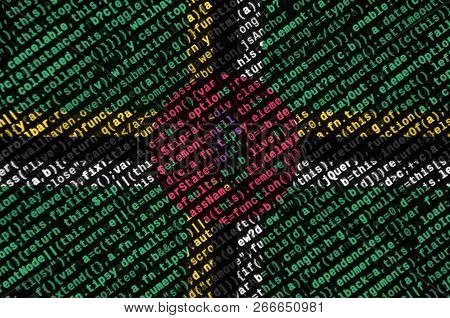 Dominica Flag  Is Depicted On The Screen With The Program Code. The Concept Of Modern Technology And