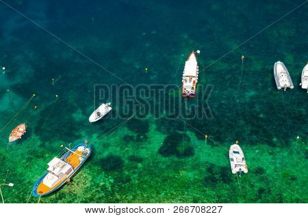 Top View From Castle On Rock Castello Ruffo Of Many Small Fishing Boats On Wave Of Turquoise Green B