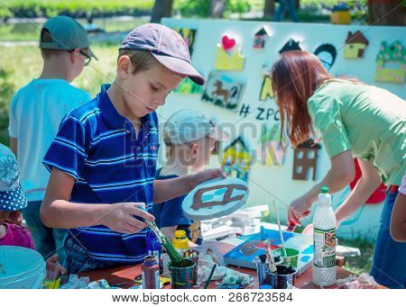 Zaporozhia/ukraine- June 2, 2018: Charity Family Festival - Boy, Participating At Art And Craft Outd