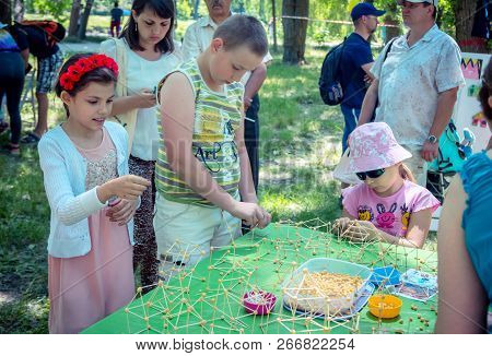 Zaporozhia/ukraine- June 2, 2018: Charity Family Festival - Boy, Participating At Art And Craft Outd