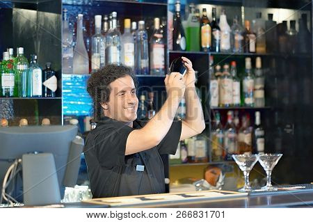 Professional Bartender Man Holding In Hands A Shaker With A Fresh Delicious Cocktail. Bartender Shak