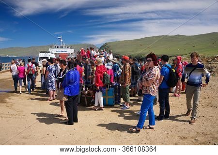 OLKHON ISLAND, 27 AUGUST, 2019: Passengers waiting the Ferry boat to Olkhon Island, Baikal Lake, Siberia, Russia