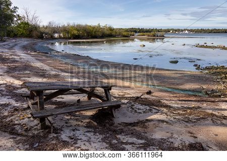 Picnic Table By Winnipeg Lake On A Summer Day
