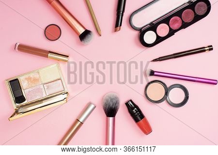 Makeup In Close View. A Lot Of Cosmetics For Woman On The Backgroud. Cosmetics Is Stacked In A Circl