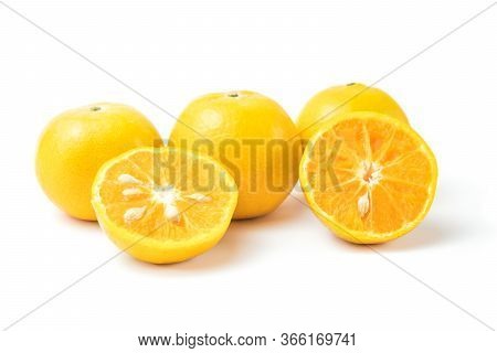 Fresh Oranges Full And Half Cut Rich In Vitamin C Isolated On White Background And Clipping Path