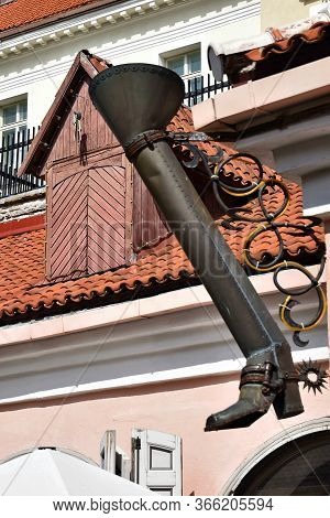 Tallinn Old Medieval Town Long Leg Street Symbol, A Gutter In The Shape Of A Long Boot.