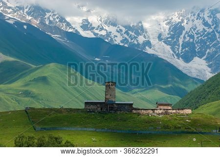 Magical View Of The Caucasus Mountains, Georgia's Highest Summit Shkhara And Lamaria Monastery, Ushg
