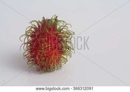 Rambutan On White Background With Copy Space For Text