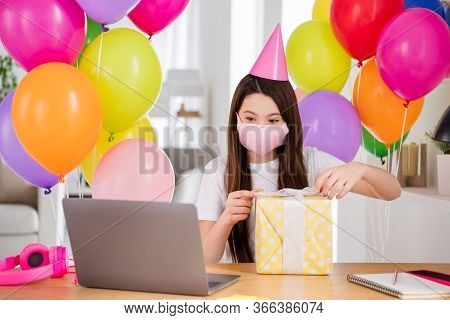 Photo Of Pretty Pupil Small School Lady Notebook Online Lesson Sit Table Safety Facial Mask Opening 