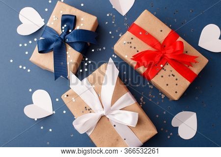 Red, Blue And White Gift Boxes And White Heart On Classic Blue Background In The National Colors Of 