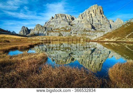 Majestic Autumn Landscape With Spectacular Mountain Lake Lago Dei Piani. Mountain Ridge Reflection I