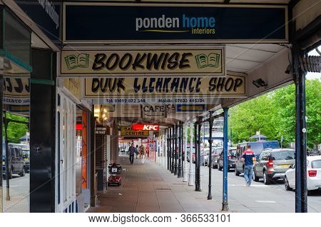 Llandudno, Uk: Aug 27, 2019: A Scenic View Of Retail Shops With Cast Iron And Glass Canopies On Most