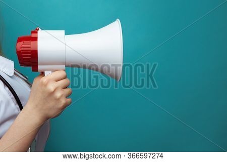 Doctors Advice And Healthcare Announcement Concept With White Lab Coat Holding A Megaphone Isolated 