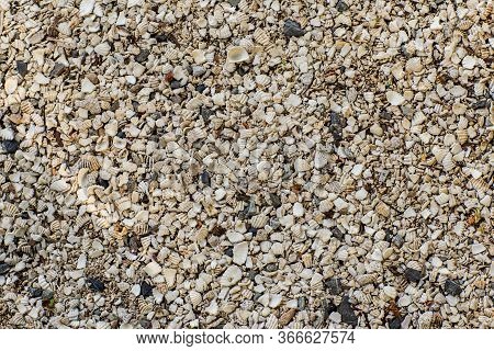 Stones Texture And Background. Rock Texture . Crushed Gravel Background. Seamless Texture Of Gravel 