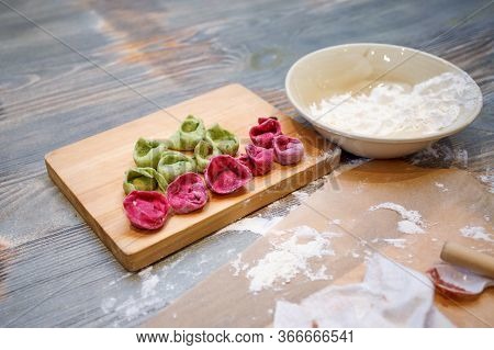 Cooking Class, Culinary. Food And People Concept, Molding Of Colorful Pelmeni Or Meat Dumplings, Nat