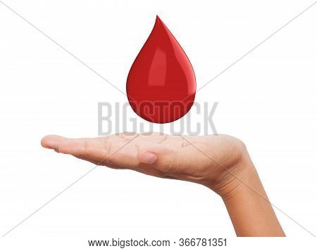 Red Blood Drop In Hand Isolated On White Background.
