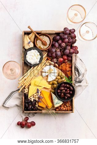 Tray With Cheese Assortment Served With Rose Wine For A Light Summer Snack, Top Downview