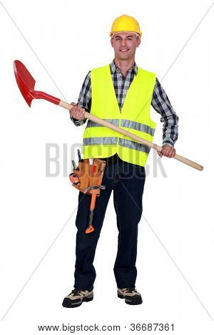 Handwerker halten eine Schaufel