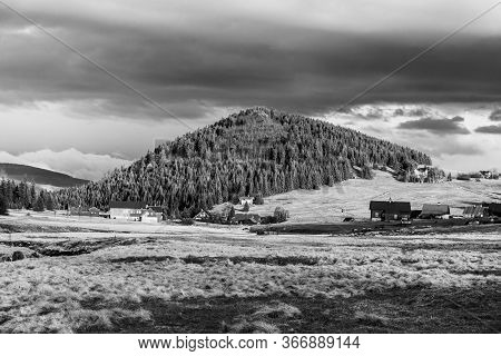 Bukovec Mountain Above Jizerka Village At Sunset Time. Spring In Jizera Mountains, Czech Republic.