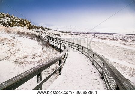 Beautiful view on Silfra rift during winter, the place where Eurasian and the American tectonic plate are divided in Thingvellir National Park, Iceland. 