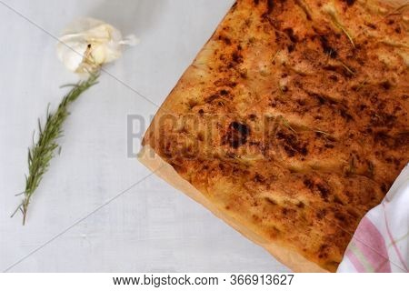 Homemade Italian Focaccia Modenese, With Rosemary And Olive Oil/ Freshly Baked Flat Bread Whit Herbs