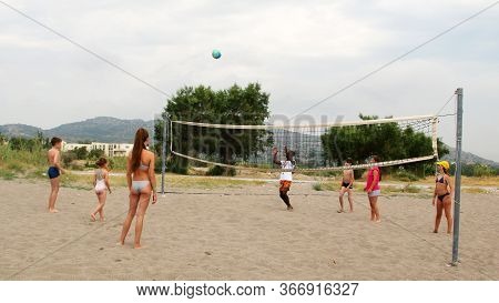 Afandou Beach, Rhodes - September 30, 2019: Children Play Beach Volleyball On The Beach, Afandou Vil