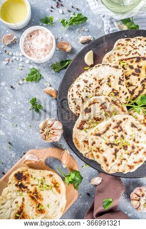 Indian Naan Flat Bread. Indian Indian Traditional Tortillas Pita Bread, With Herbs, Olive Oil And Ga