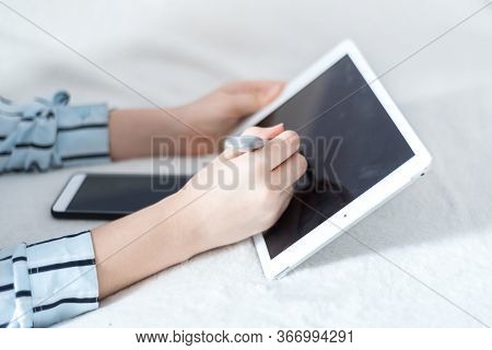 Distance Learning At Home. Schoolgirl Sitting At Laptop And Studying. Online Education Concept. Soci