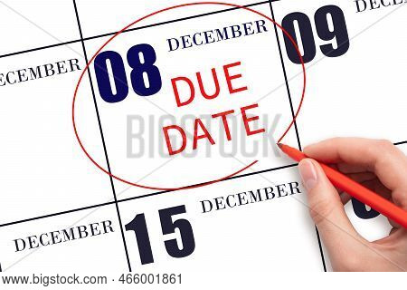 8th Day Of December. Hand Writing Text Due Date On Calendar Date December 8 And Circling It. Payment