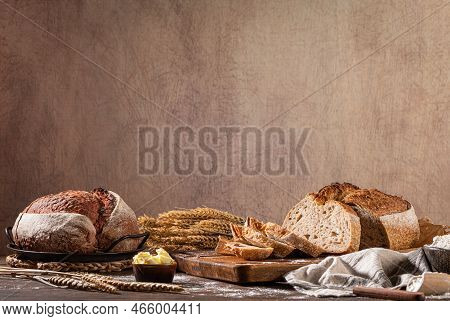 Freshly Artisan Baked Wheat And Rye Bread, Country Bread. Simple Bread  With Butter For Breackfast