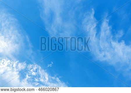 Clouds In The Blue Sky. Natural Sky Background Texture, Beautiful Color. Peaceful Blue Sky With Ligh