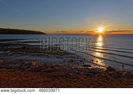 Sunrise Over Tje St-lawrence River Waters In La Malbaie, Quebec