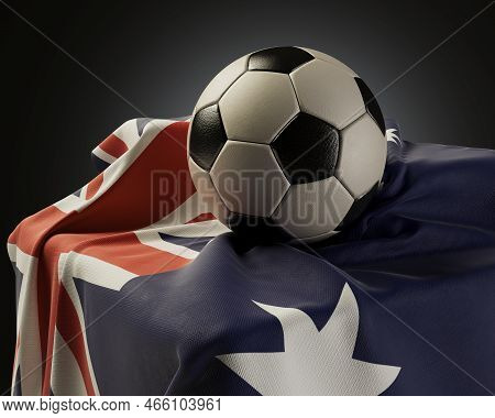 A Regular Soccer Balls Resting On An Australia Flag Draped Over A Plinth On An Isolated Studio Backg