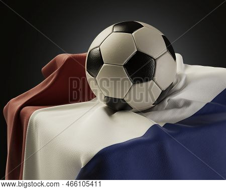 A Regular Soccer Balls Resting On A Netherlands Flag Draped Over A Plinth On An Isolated Studio Back