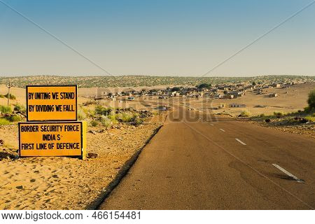 Milestone By Bsf, Border Security Force, Beside With Empty High Road Or National High Way Passing Th