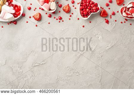 Valentine's Day Concept. Top View Photo Of Heart Shaped Saucers With Sweets Jelly And Chocolate Cand